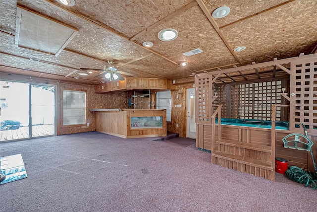 7650 Smiling Wood Ln, Houston, TX 77086 - unfurnished living room featuring carpet flooring and a ceiling fan