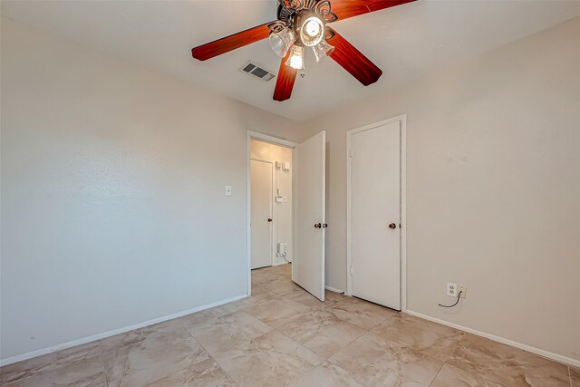 7650 Smiling Wood Ln, Houston, TX 77086 - spare room featuring ceiling fan and baseboards