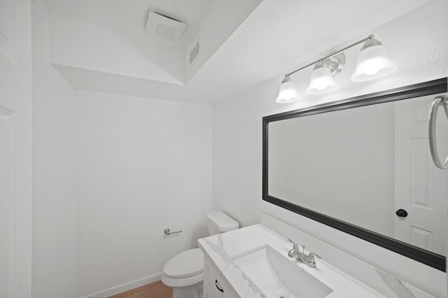 13510 Cedar Point Dr, Cypress, TX 77429 - bathroom with vanity, toilet, and wood finished floors
