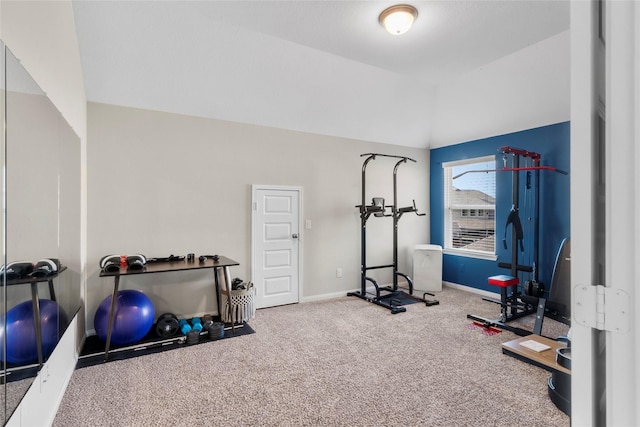 20714 Fertile Valley Ln, Richmond, TX 77407 - exercise room featuring baseboards, carpet flooring, and vaulted ceiling