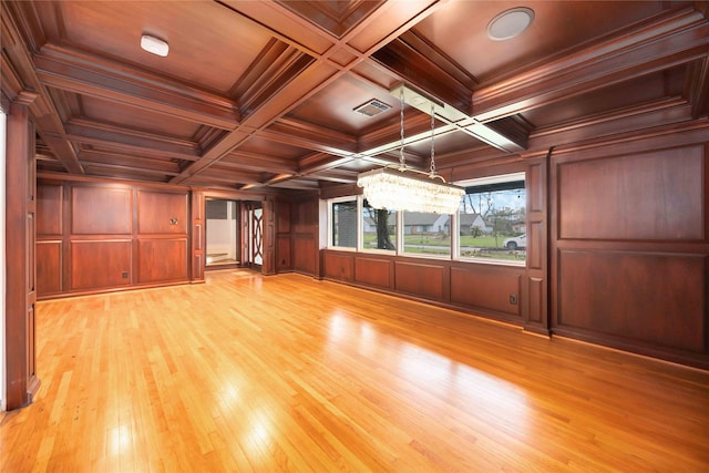 4031 Fernwood Dr, Houston, TX 77021 - unfurnished room featuring a chandelier, light wood-style floors, a wooden ceiling with exposed beams, and ornamental molding