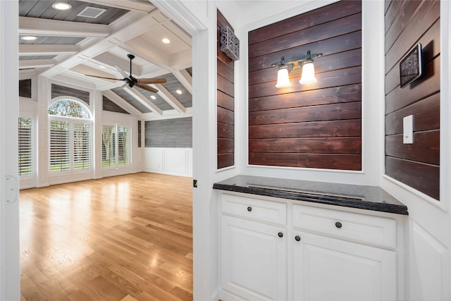 4031 Fernwood Dr, Houston, TX 77021 - bar with a ceiling fan, light wood-style floors, recessed lighting, and a decorative wall