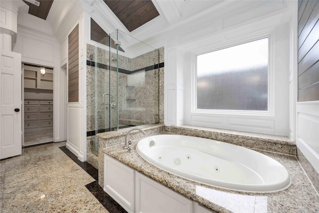 4031 Fernwood Dr, Houston, TX 77021 - bathroom featuring a decorative wall, a shower stall, a whirlpool tub, granite tiled floors, and crown molding