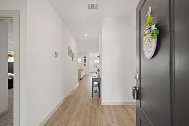 1103 Curly Angora Ct, Rosharon, TX 77583 - hall with light wood-style floors, recessed lighting, and baseboards