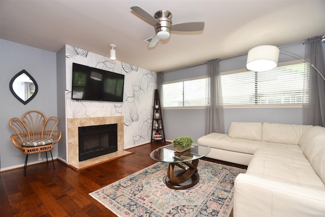19 Sawmill Grove Ln, The Woodlands, TX 77380 - living area with a ceiling fan, wood finished floors, a high end fireplace, and baseboards