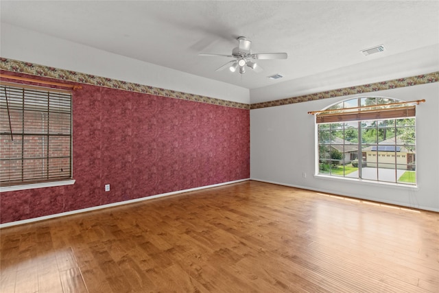 16418 Great Frst, Humble, TX 77346 - unfurnished room with wood finished floors and a ceiling fan