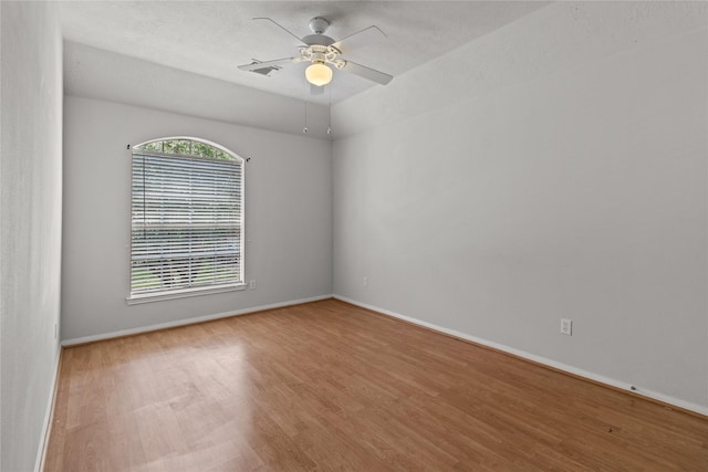 16418 Great Frst, Humble, TX 77346 - empty room with wood finished floors and ceiling fan