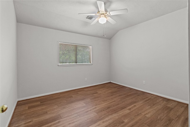 16418 Great Frst, Humble, TX 77346 - spare room featuring wood finished floors, a ceiling fan, and lofted ceiling