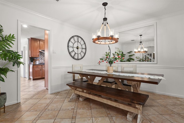 939 Mulberry Ridge Way, Houston, TX 77062 - dining area featuring a chandelier, ornamental molding, baseboards, and light tile patterned floors