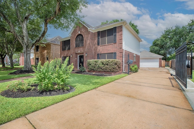939 Mulberry Ridge Way, Houston, TX 77062 - view of front of house with brick siding, a detached garage, and an outbuilding