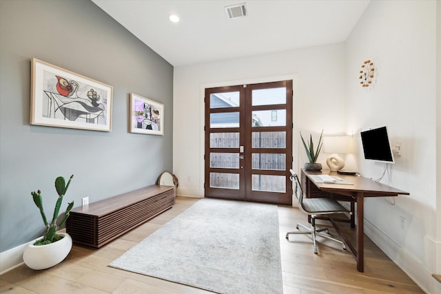 823 Aurora St, Houston, TX 77009 - office area featuring french doors, wood finished floors, and recessed lighting