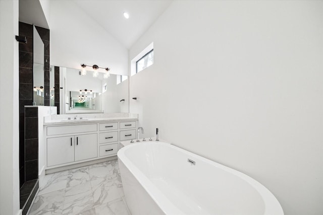 823 Aurora St, Houston, TX 77009 - full bathroom featuring a freestanding bath, marble finish floors, vanity, tiled shower, and high vaulted ceiling