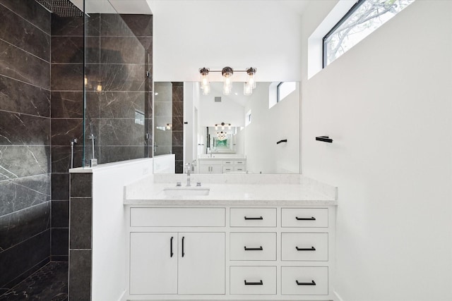 823 Aurora St, Houston, TX 77009 - bathroom featuring walk in shower and vanity