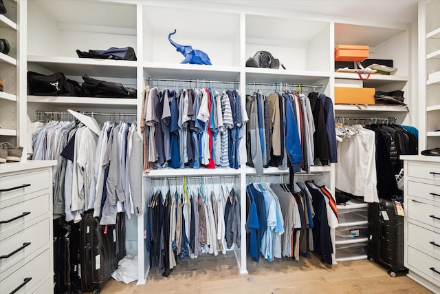 823 Aurora St, Houston, TX 77009 - spacious closet featuring wood finished floors
