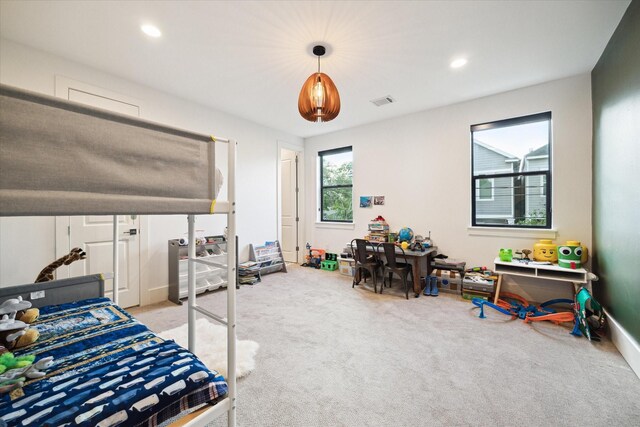 823 Aurora St, Houston, TX 77009 - carpeted bedroom featuring recessed lighting