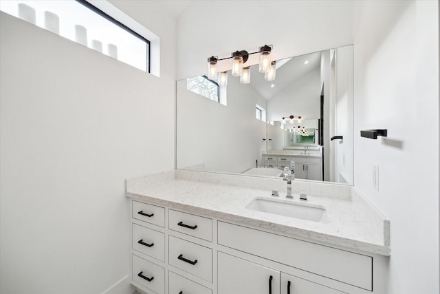 823 Aurora St, Houston, TX 77009 - bathroom with vanity and vaulted ceiling