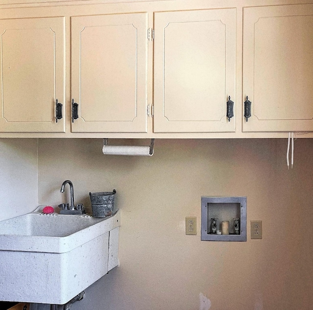 409 W Collier St, Jasper, TX 75951 - washroom featuring cabinet space, hookup for a washing machine, and electric dryer hookup