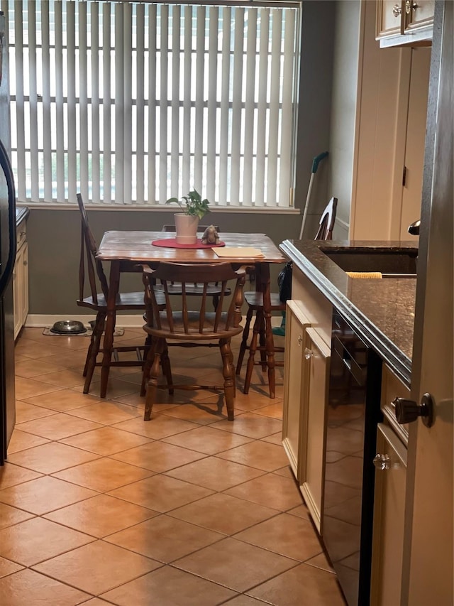 2002 Savanna Ct N, League City, TX 77573 - dining room with light tile patterned floors and breakfast area