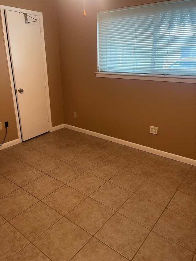 2002 Savanna Ct N, League City, TX 77573 - tiled empty room with baseboards