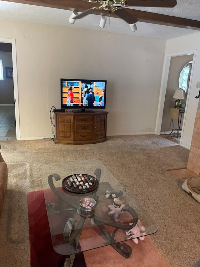 2002 Savanna Ct N, League City, TX 77573 - living room with ceiling fan, carpet floors, and a textured ceiling