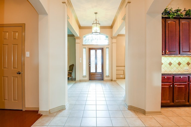 14719 Golden Bough Ln, Humble, TX 77396 - foyer entrance with light tile patterned floors and arched walkways