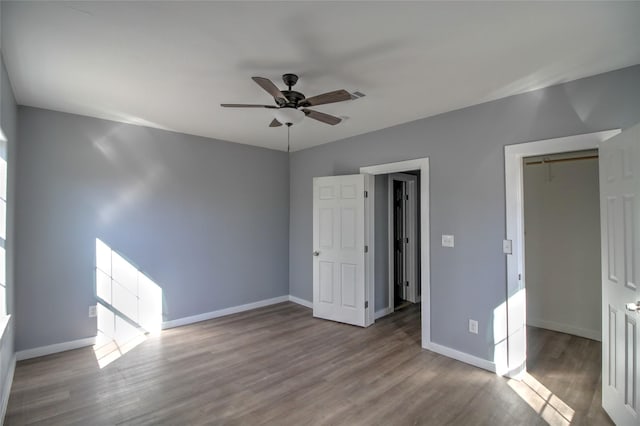 322 Montrose St, Lufkin, TX 75901 - unfurnished bedroom with wood finished floors, baseboards, and a ceiling fan