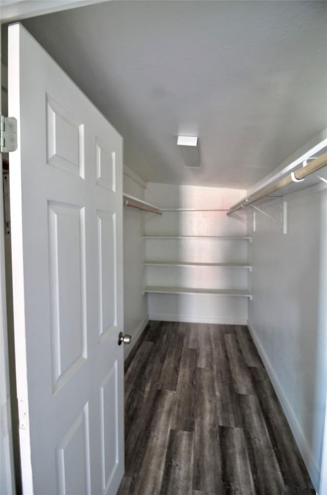 322 Montrose St, Lufkin, TX 75901 - spacious closet with dark wood-style flooring