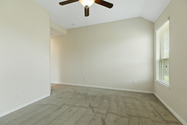 23106 Tindarey Falls Ln, Katy, TX 77493 - empty room with carpet floors, ceiling fan, vaulted ceiling, and baseboards
