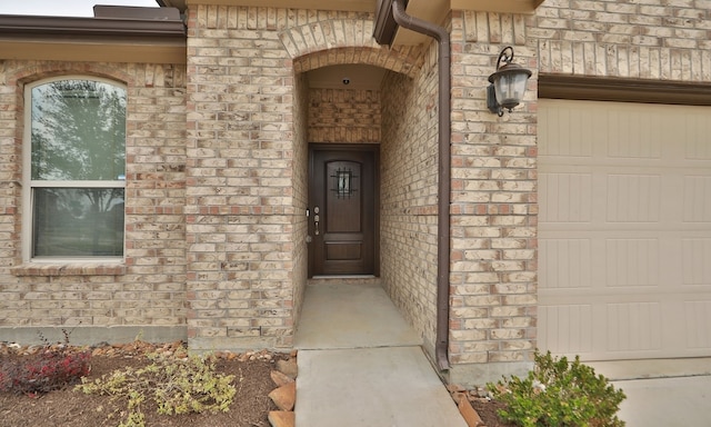 23106 Tindarey Falls Ln, Katy, TX 77493 - doorway to property with brick siding and an attached garage
