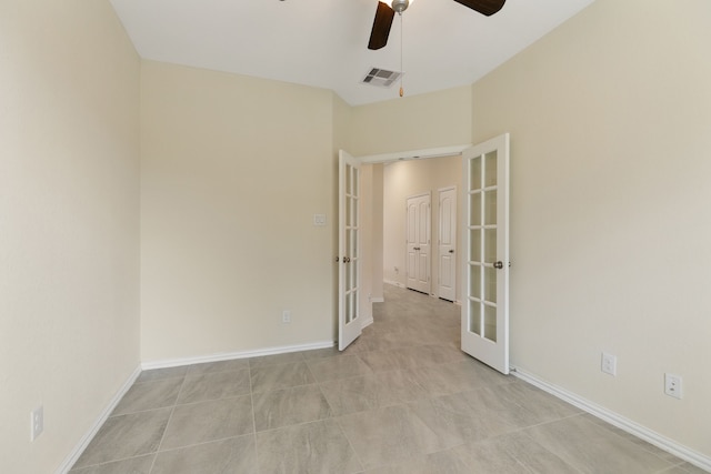 23106 Tindarey Falls Ln, Katy, TX 77493 - empty room featuring french doors, ceiling fan, and baseboards