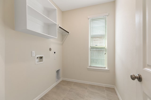 23106 Tindarey Falls Ln, Katy, TX 77493 - laundry room featuring hookup for an electric dryer, hookup for a gas dryer, hookup for a washing machine, and plenty of natural light