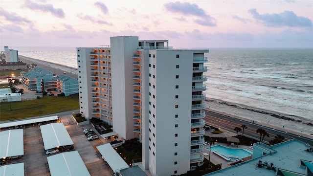 7700 Seawall Blvd Unit 512, Galveston, TX 77551 - view of apartment building / complex featuring view of water and beach