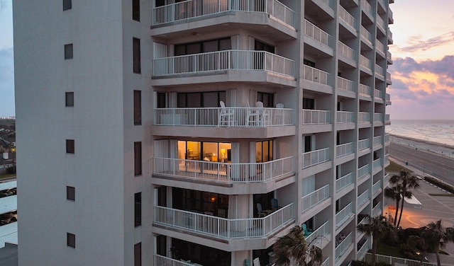 7700 Seawall Blvd Unit 512, Galveston, TX 77551 - view of apartment building / complex featuring view of water and beach