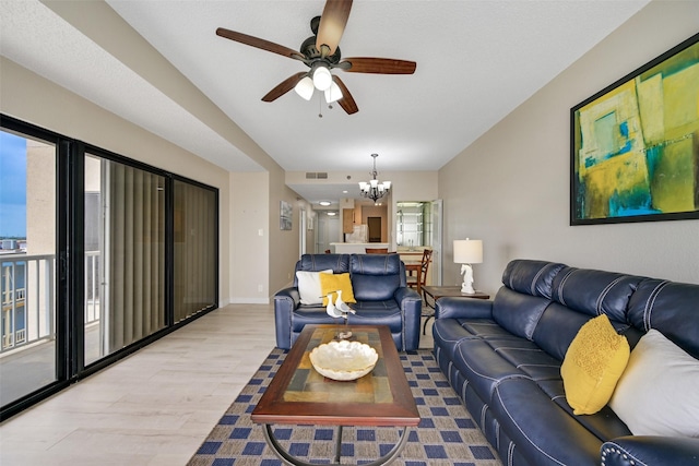 7700 Seawall Blvd Unit 512, Galveston, TX 77551 - living room with ceiling fan, a chandelier, light wood-style flooring, and vaulted ceiling