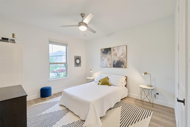 20159 Clear Ridge Ln, Montgomery, TX 77316 - bedroom featuring light wood-type flooring, baseboards, and ceiling fan