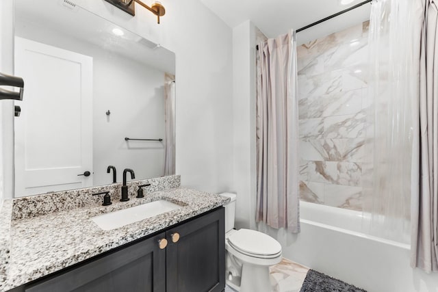 10411 E Rio Grande River Dr, Cypress, TX 77433 - bathroom with marble look tiles, toilet, vanity, and shower / bathtub combination with curtain