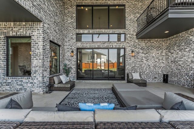 10411 E Rio Grande River Dr, Cypress, TX 77433 - view of patio / terrace featuring outdoor lounge area and a balcony