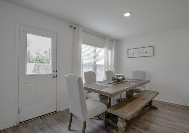 6125 Dunsmore Canyon Ln, Porter, TX 77365 - dining room with wood finished floors and baseboards