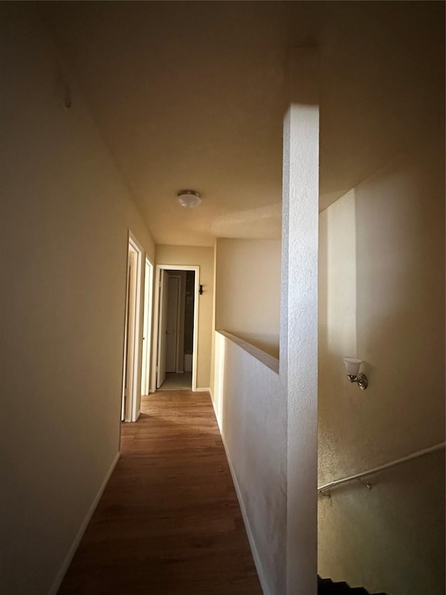 8405 Wilcrest Dr Unit 2010, Houston, TX 77072 - corridor with wood finished floors and baseboards