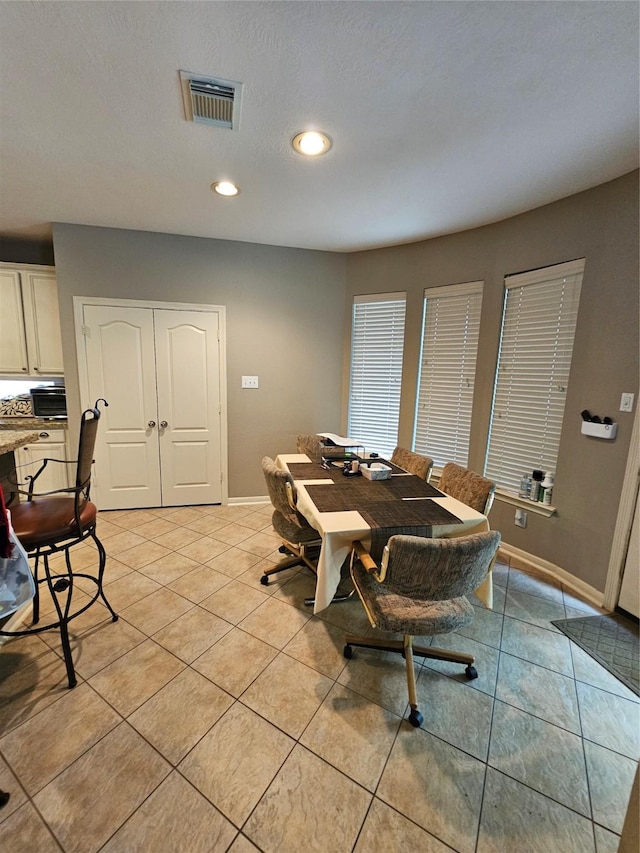 21235 Pennshore Ln, Katy, TX 77450 - dining space featuring light tile patterned floors, baseboards, and recessed lighting