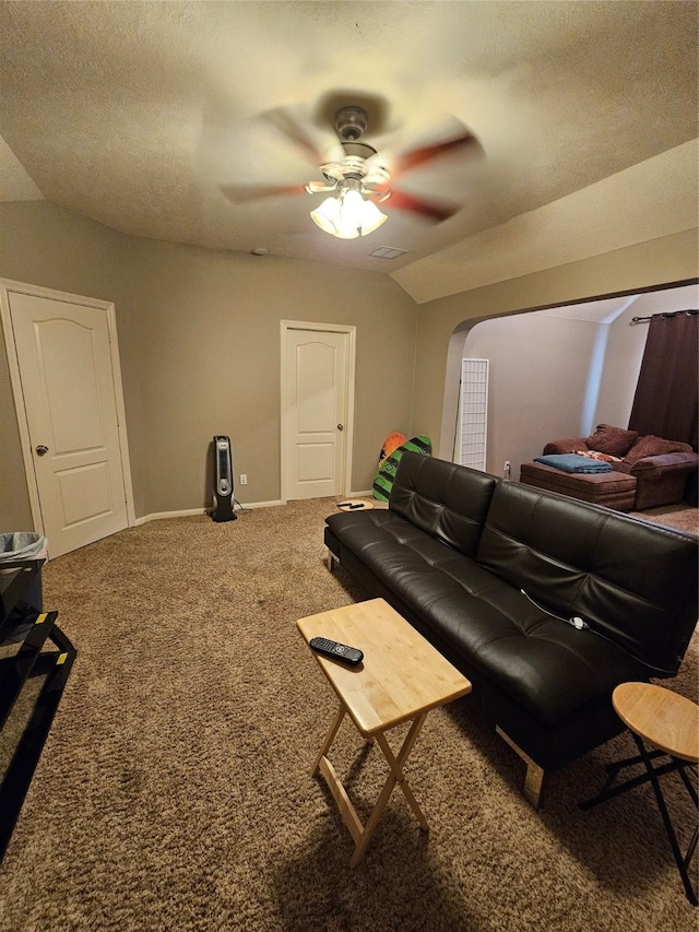 21235 Pennshore Ln, Katy, TX 77450 - carpeted living area with a ceiling fan, baseboards, and arched walkways