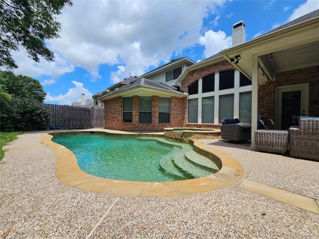 21235 Pennshore Ln, Katy, TX 77450 - view of swimming pool featuring a patio area and a pool with connected hot tub