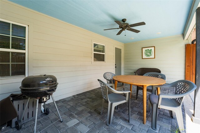 9305 Emnora Ln, Houston, TX 77080 - view of patio / terrace with a ceiling fan, a grill, and outdoor dining space