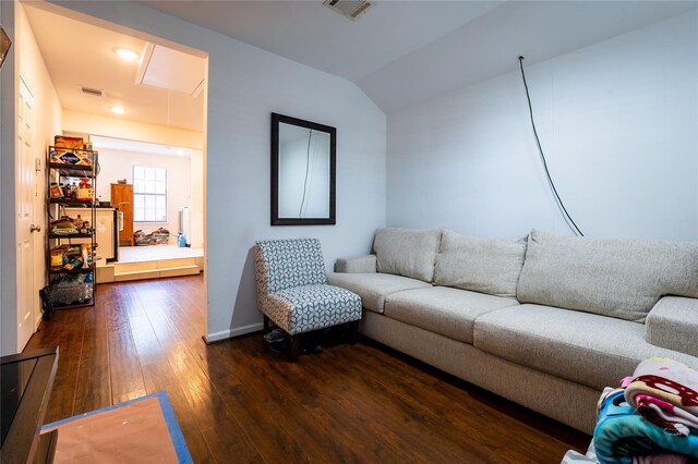 9305 Emnora Ln, Houston, TX 77080 - living room featuring attic access, dark wood-style floors, and lofted ceiling