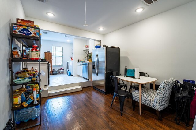 9305 Emnora Ln, Houston, TX 77080 - dining space with dark wood-style flooring and recessed lighting