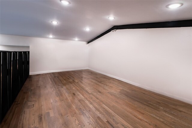 9305 Emnora Ln, Houston, TX 77080 - bonus room with lofted ceiling, wood finished floors, baseboards, and recessed lighting