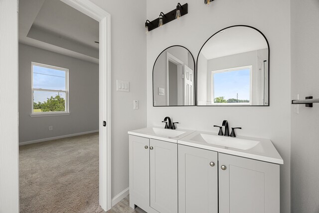 8 Donna Ct, Brookshire, TX 77423 - full bathroom featuring double vanity and baseboards