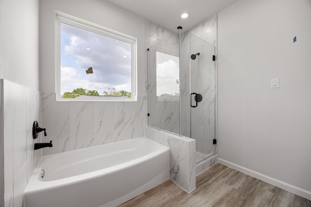 8 Donna Ct, Brookshire, TX 77423 - full bath featuring a garden tub, a marble finish shower, and wood finished floors