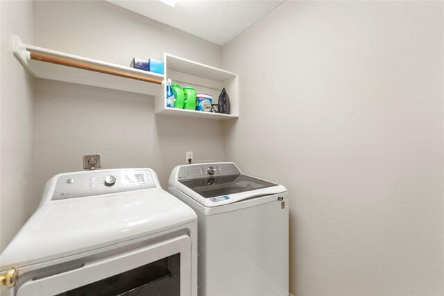 6923 Cobblestone Path, Houston, TX 77084 - washroom with washing machine and dryer