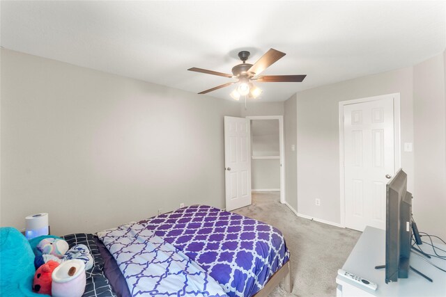 6923 Cobblestone Path, Houston, TX 77084 - carpeted bedroom featuring a ceiling fan and baseboards
